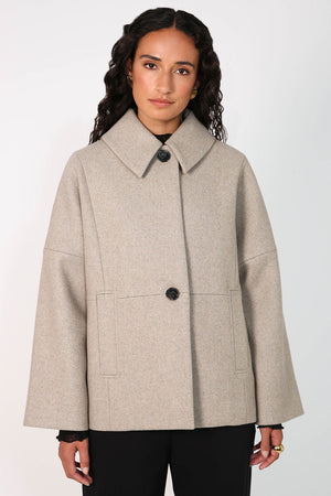 crescent coat / sandstone